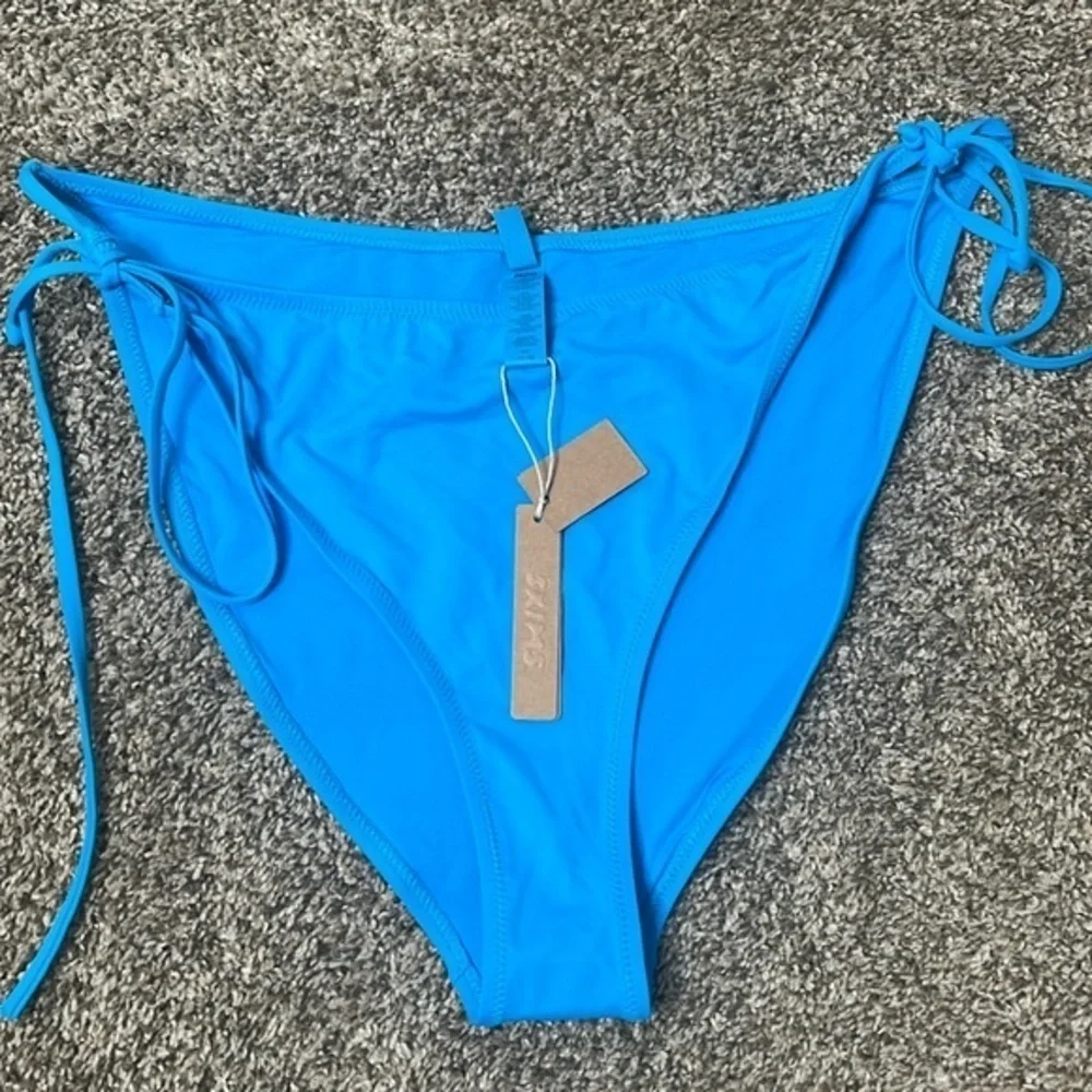 NWT Skims swim dippy tie bottom Sz 4x turquoise